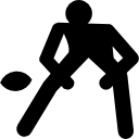 silhueta do jogador de rugby flexionada para frente para pegar a bola que se aproxima 