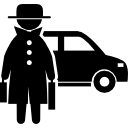 Criminal front standing with two suitcases covered by hat and coat with a car behind 