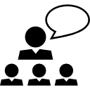 Teacher talking to a group 