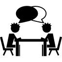 alunos conversando em uma mesa 