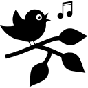pássaro cantando em um galho com folhas 