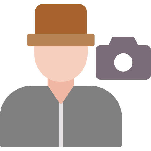 Photographer free icon Photographer free icon